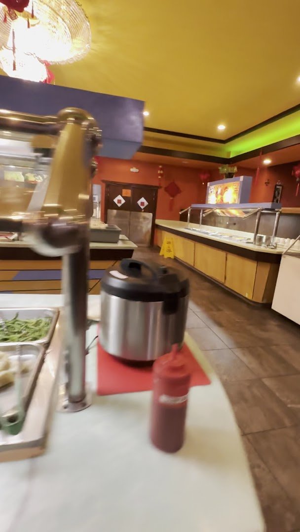 Seafood buffet spread beside hibachi station